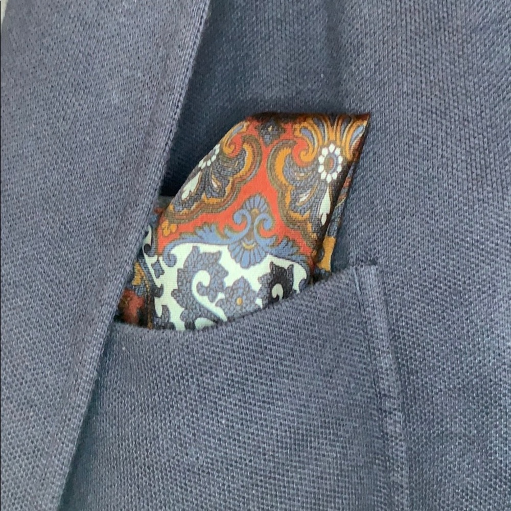 Also patterned pocket square.